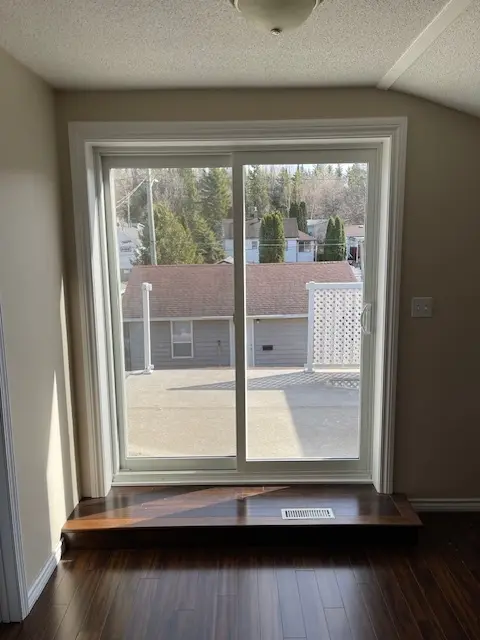 White Buckingham Patio Doors installed in northwestern Ontario, installation in all seasons, over 32 years in business, areas include Dryden, Kenora, Fort Frances, Sioux Lookout, Nestor Falls, Sioux Narrows.