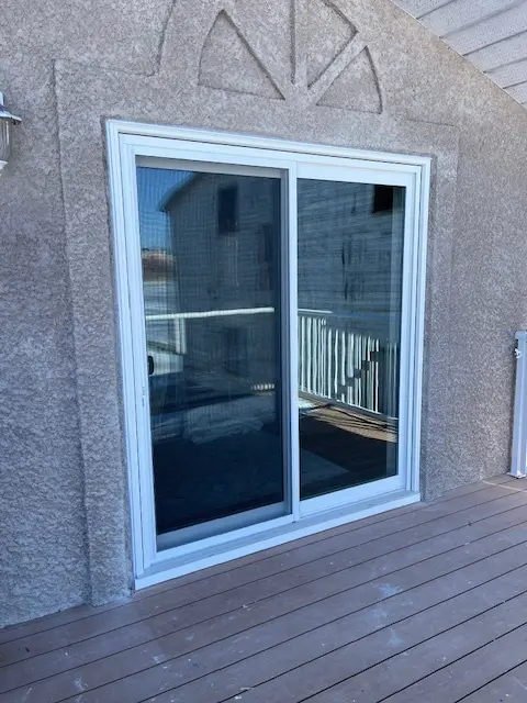 White Buckingham Patio Doors installed in northwestern Ontario, installation in all seasons, over 32 years in business, areas include Dryden, Kenora, Fort Frances, Sioux Lookout, Nestor Falls, Sioux Narrows.