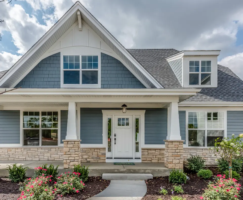 Modern home exterior featuring energy-efficient windows and stylish entry doors