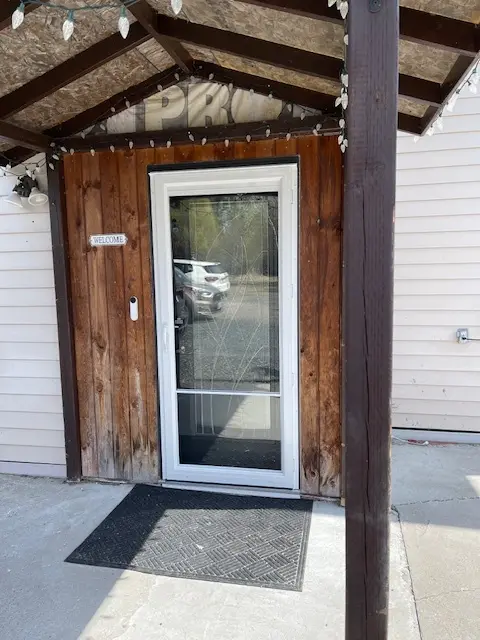 Self Storing Storm Door, White Aluminum Storm Door, Fort Frances, Kenora, Dryden, Sioux Lookout, Ontario, Canada, Northwestern Ontario